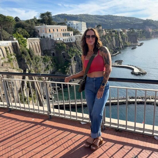 A solo traveler exploring Positano in Italy