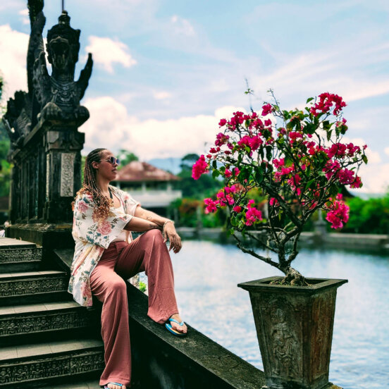 A solo traveller at a temple in Bali